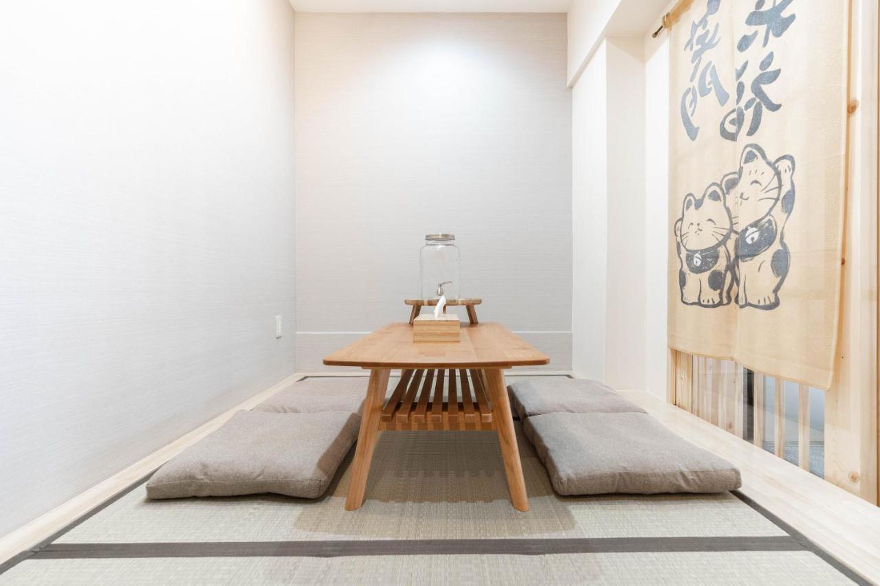 Hospedagem domiciliar 大阪道顿堀 铁甲猫の家 Osaka